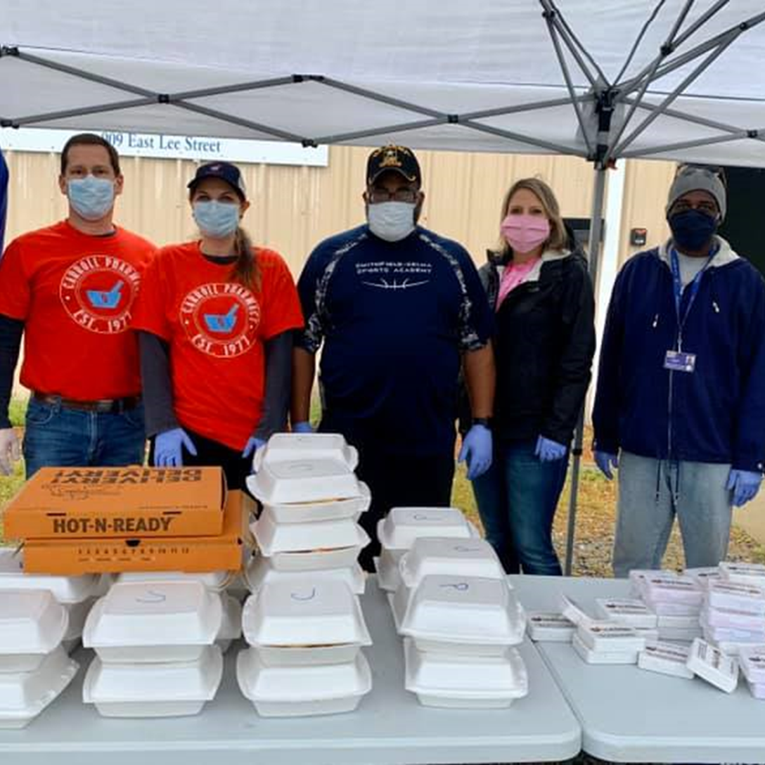 Carroll Pharmacy handing out free pizza and box lunches to their community