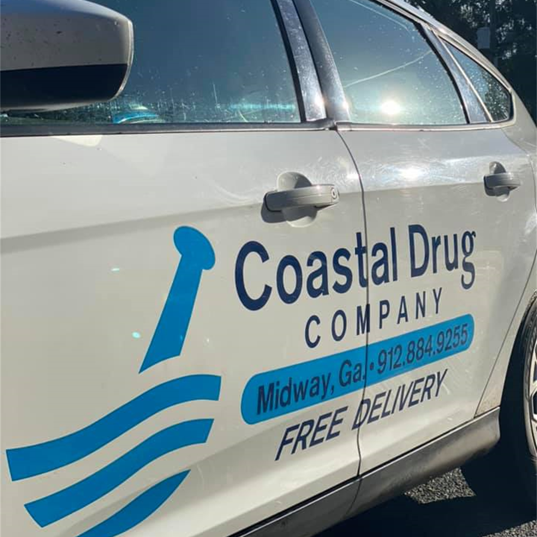 The side of a Coastal Drug Company delivery vehicle