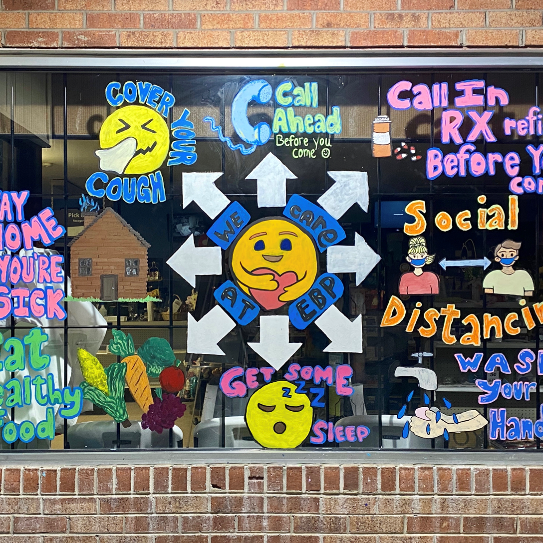 The store window at East Burke Pharmacy handpainted by their staff