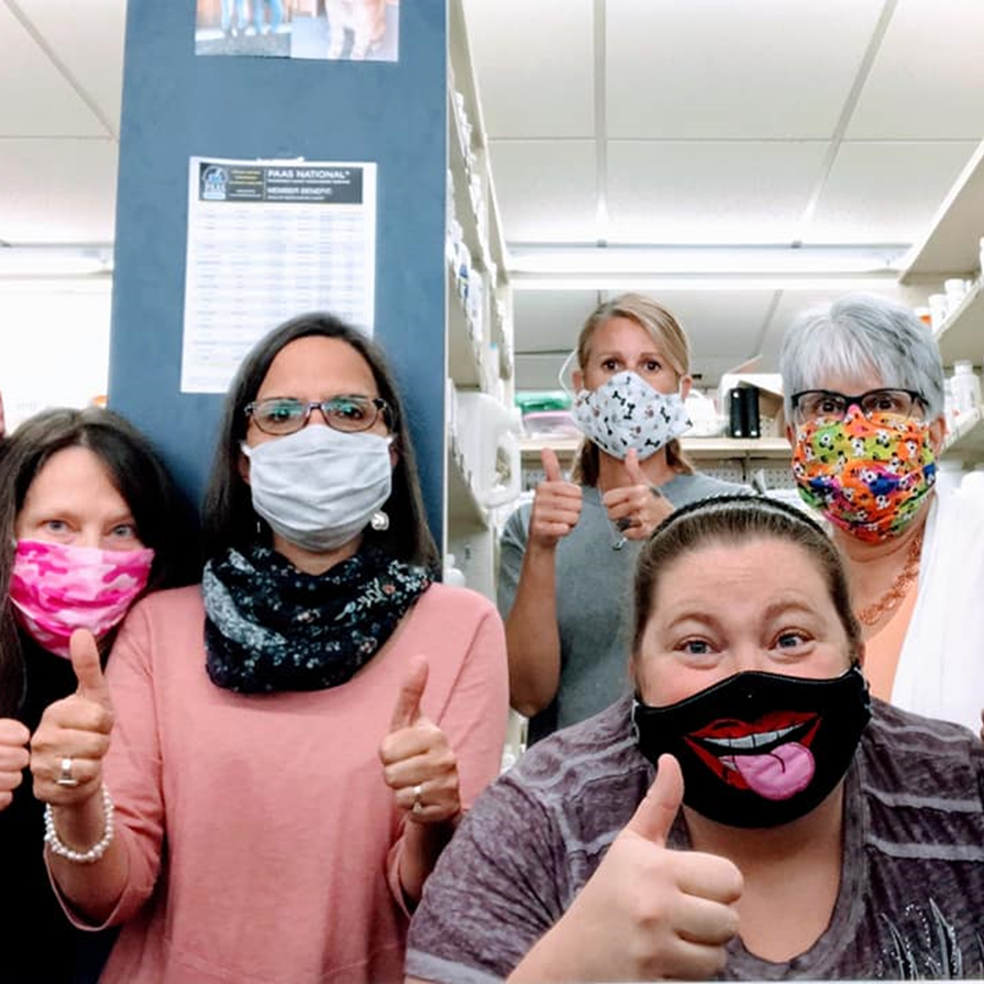 The Madison Pharmacy team wearing face masks