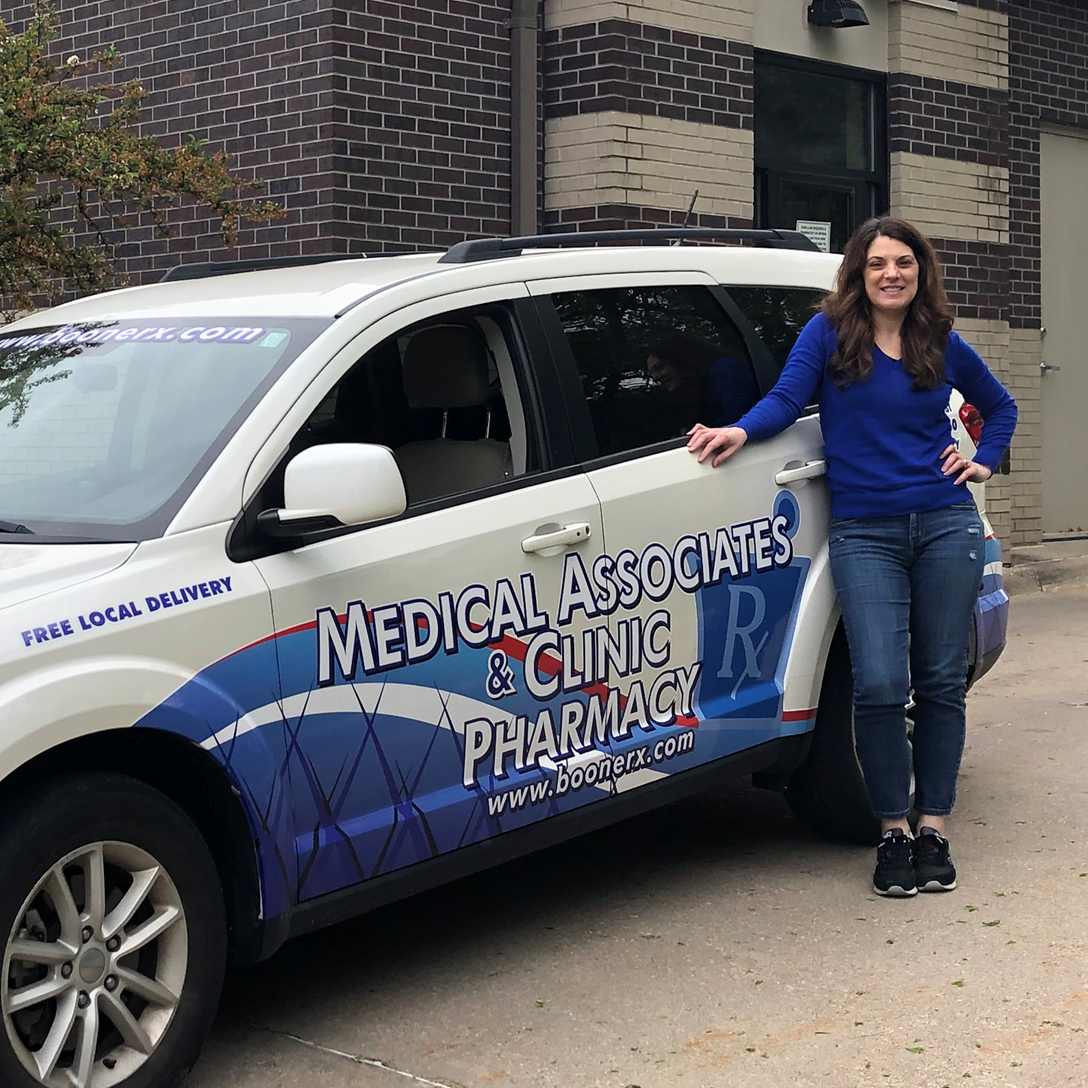 Medical Associates Pharmacy and Clinic Pharmacy using their delivery vehicle to drop off prescriptions to patients