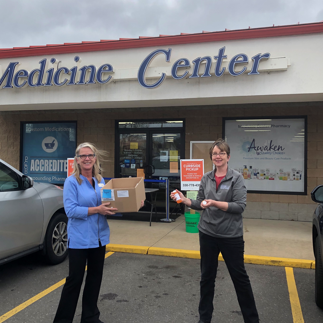 Medicine Center Pharmacy donating hand sanitizer to Community Hospice