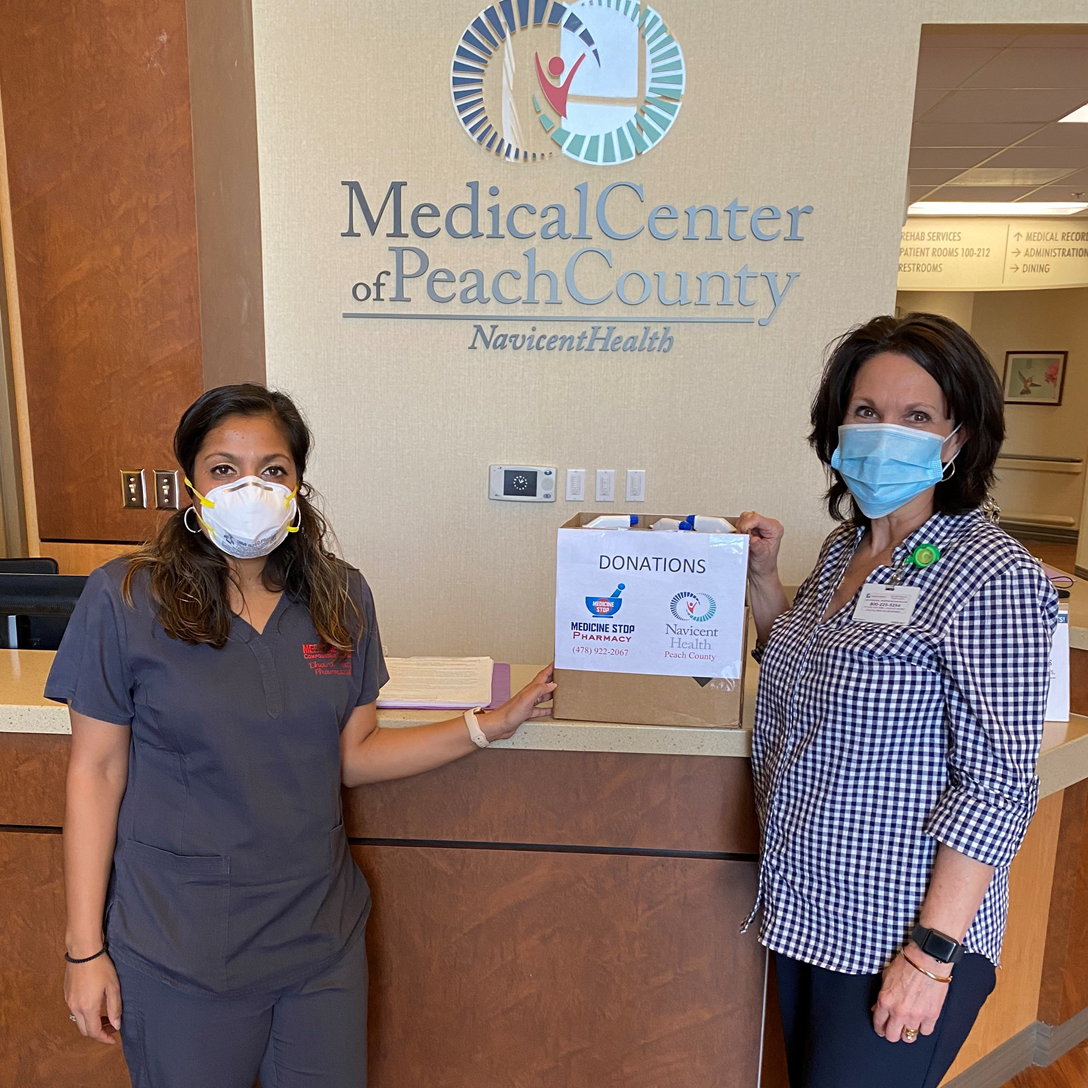 Medicine Stop Pharmacy donating compounded hand sanitizer to the Medical Center of Peach County