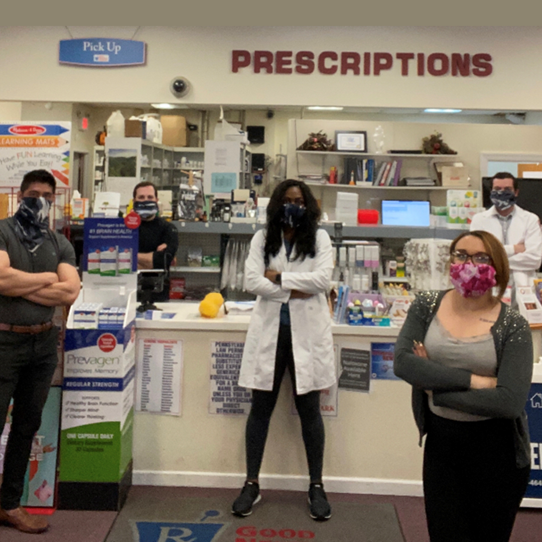 Springfield Pharmacy practicing social distancing and wearing face masks